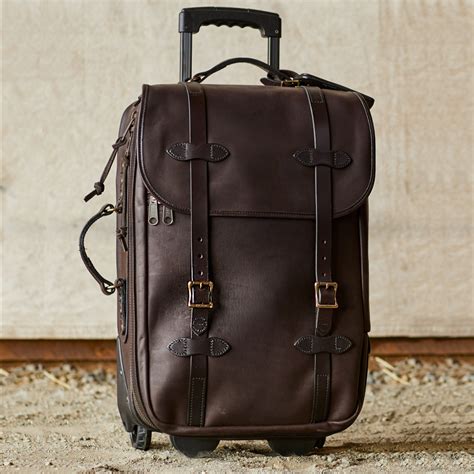 rolling leather carry on bag.